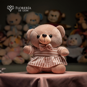 Oso café con vestido de rayas